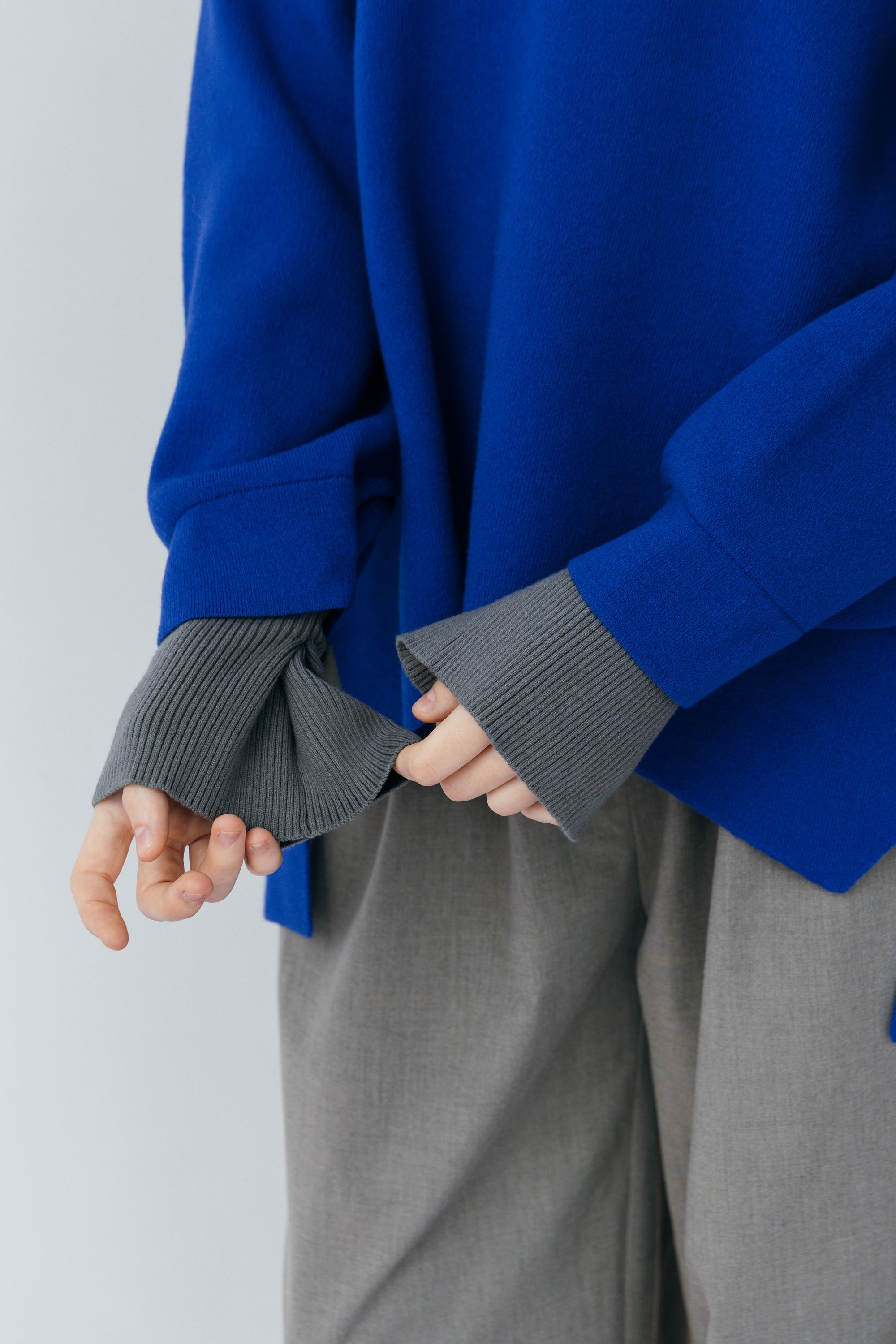 TWO-TONE LAYERED KNIT TOP